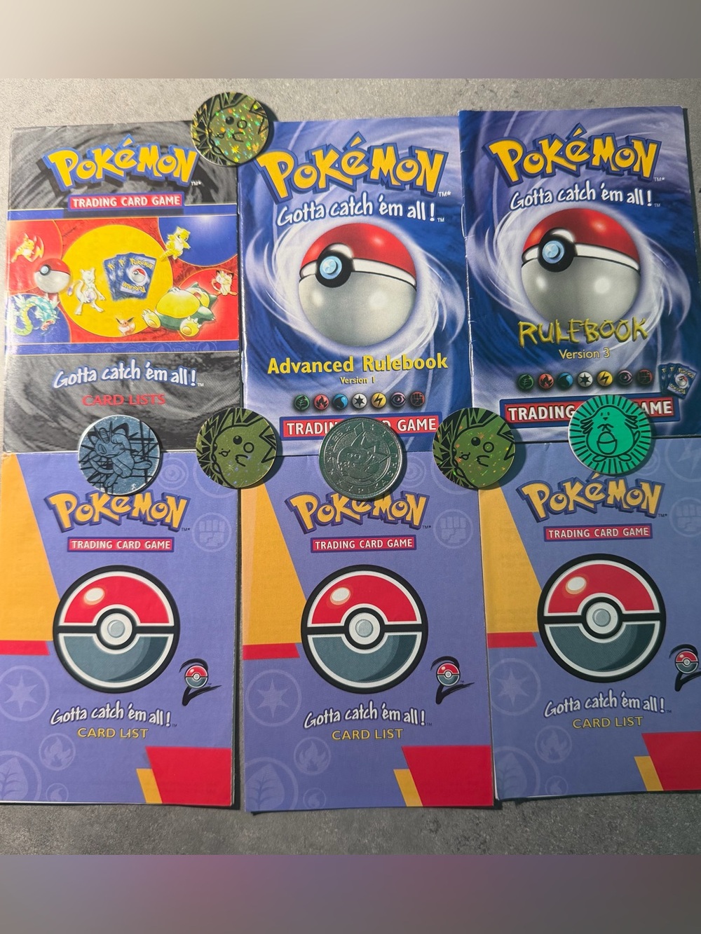 Pokemon Vintage Coins, Rule Books & Card Lists Lot  - 2 Books 4 Lists 6 Coins